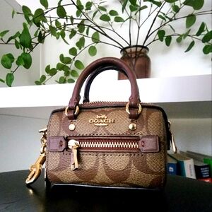 Coach Signature brown leather keychain bag charm wallet earphone case